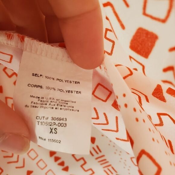 Lush geometric sleeveless faux wrap front shirt - Picture 2 of 6